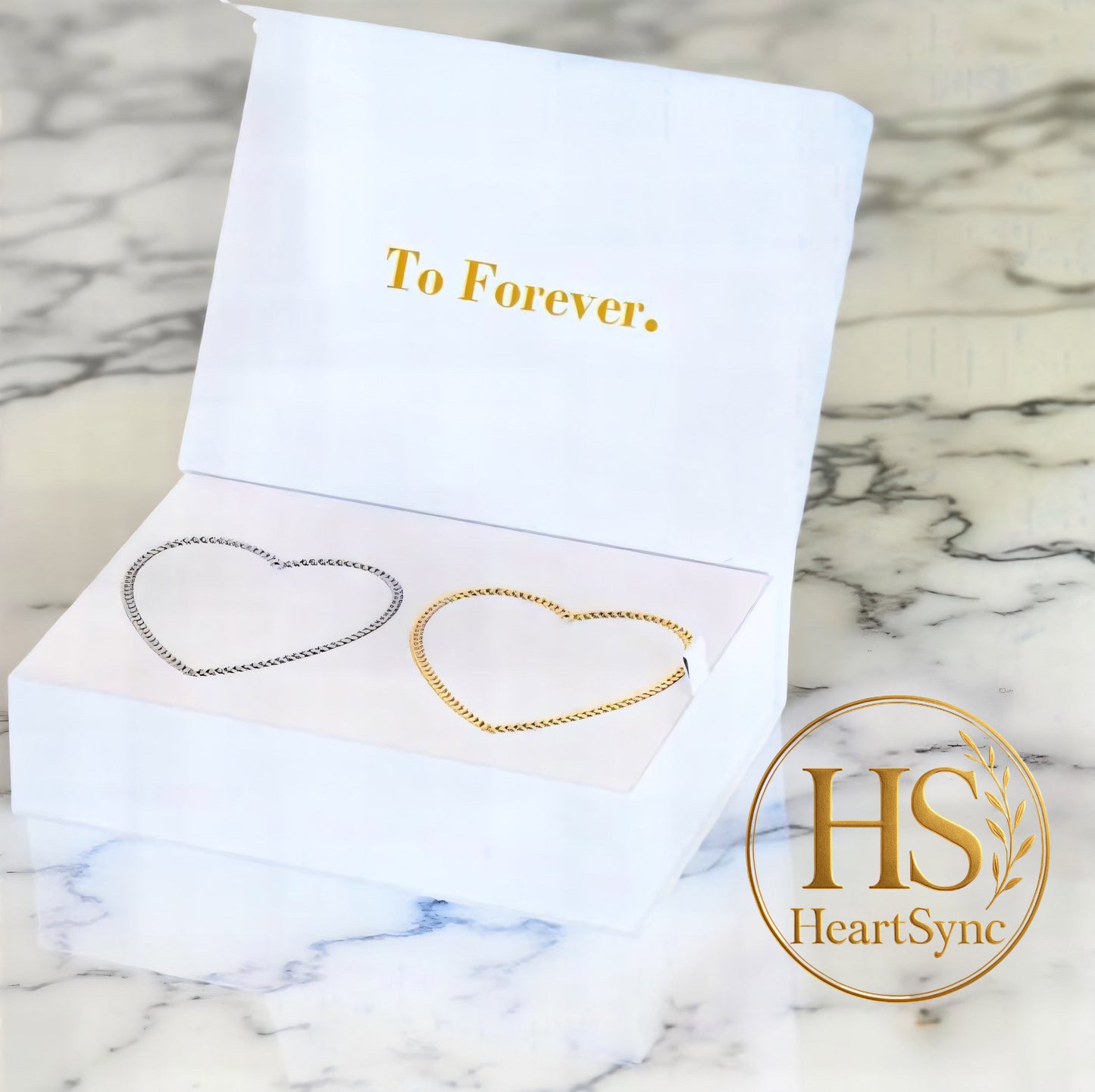 Heartsync Permanent Bracelet gift box featuring two heart-shaped bracelets (gold & silver) with "To Forever." inscription.