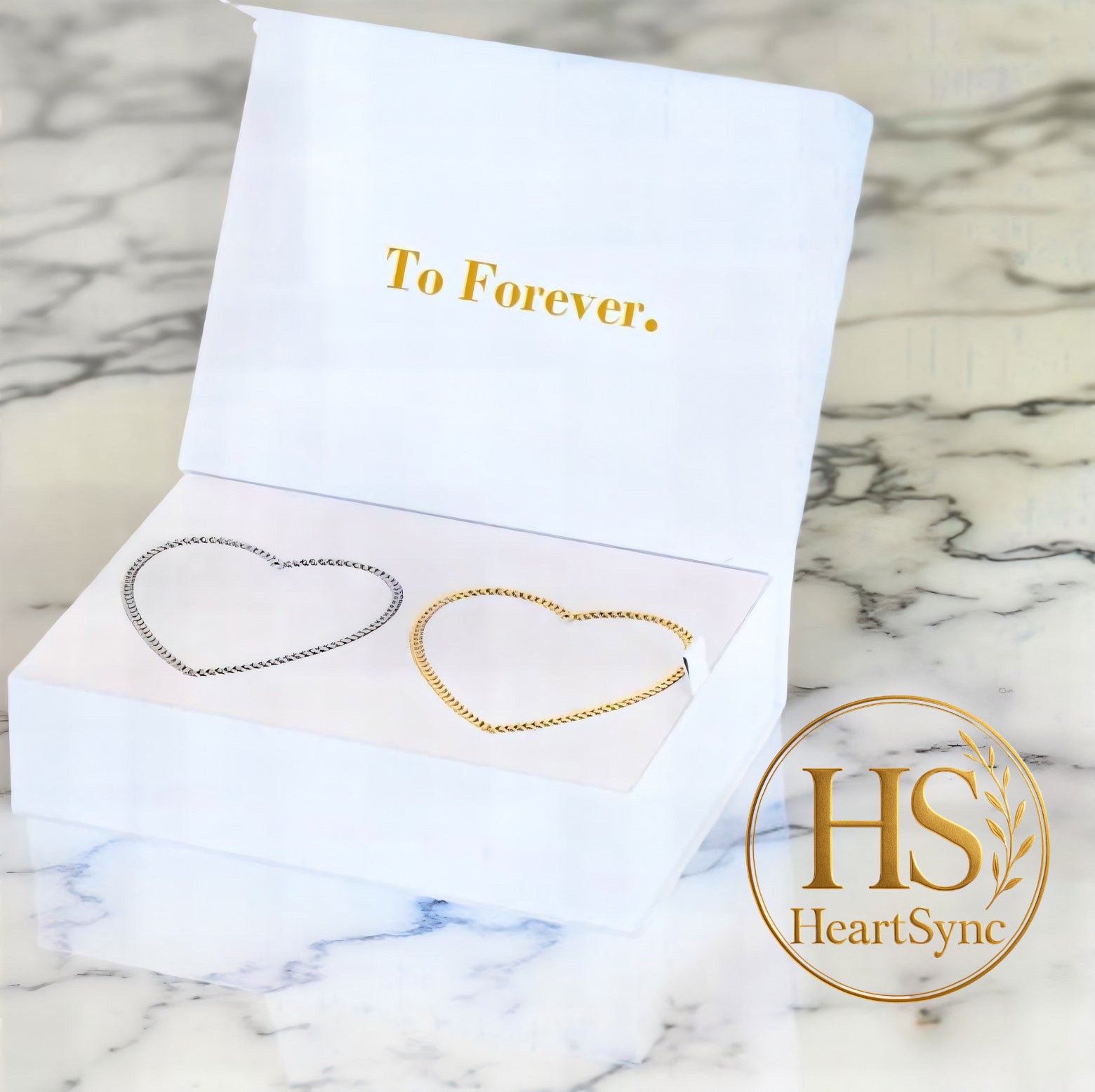 Heartsync Permanent Bracelet gift box featuring two heart-shaped bracelets (gold & silver) with "To Forever." inscription.