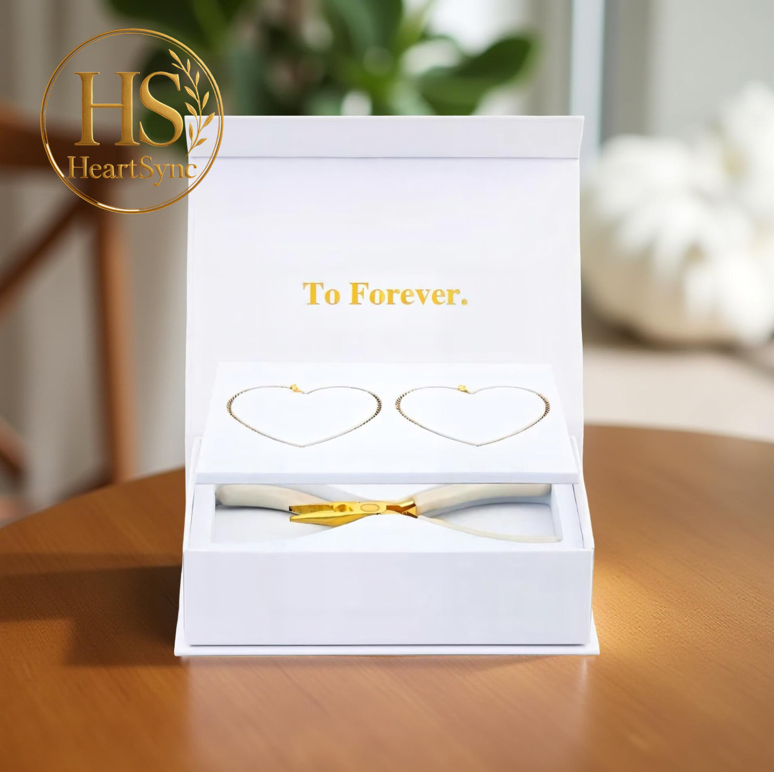 Heartsync Permanent Bracelet kit opened, showing two heart-shaped bracelets and special tools to install the bracelet. "To